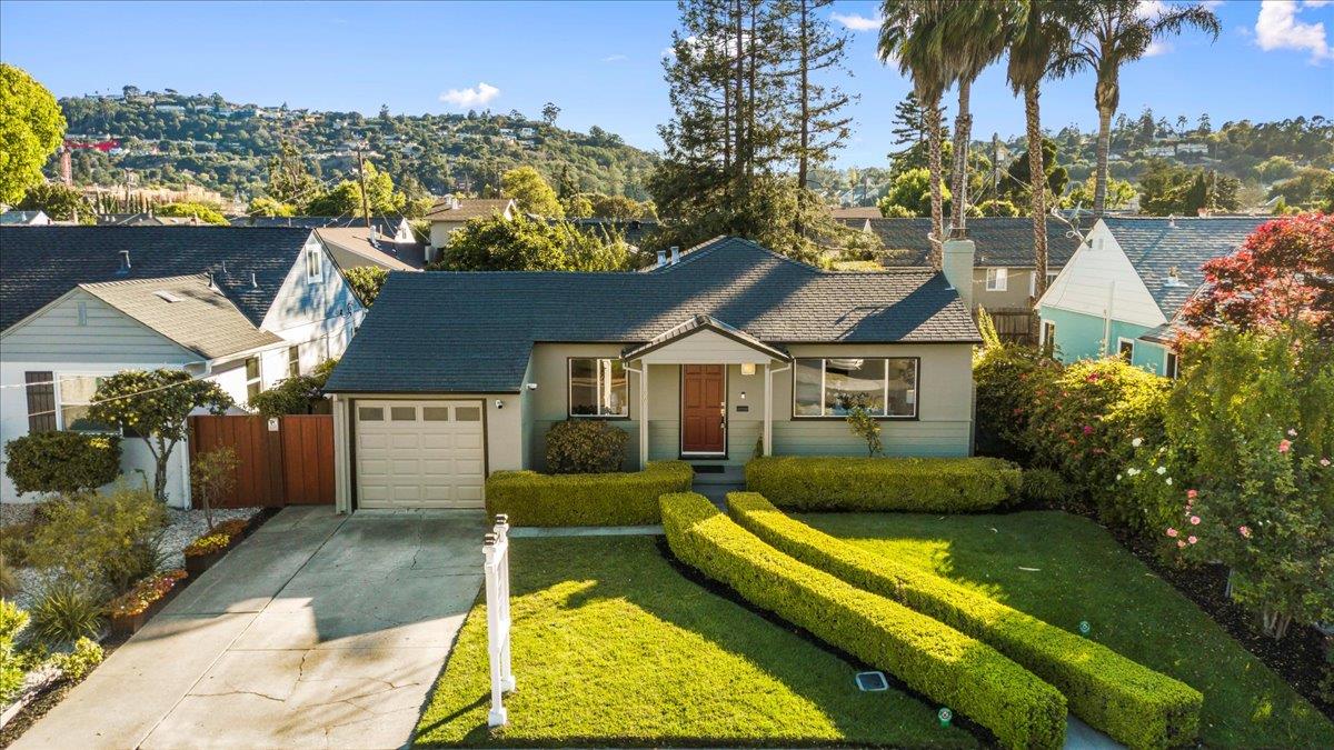 1100 Irwin Street Belmont, CA 94002 - Photo 11 of 53 a view of a house with a swimming pool and a chairs