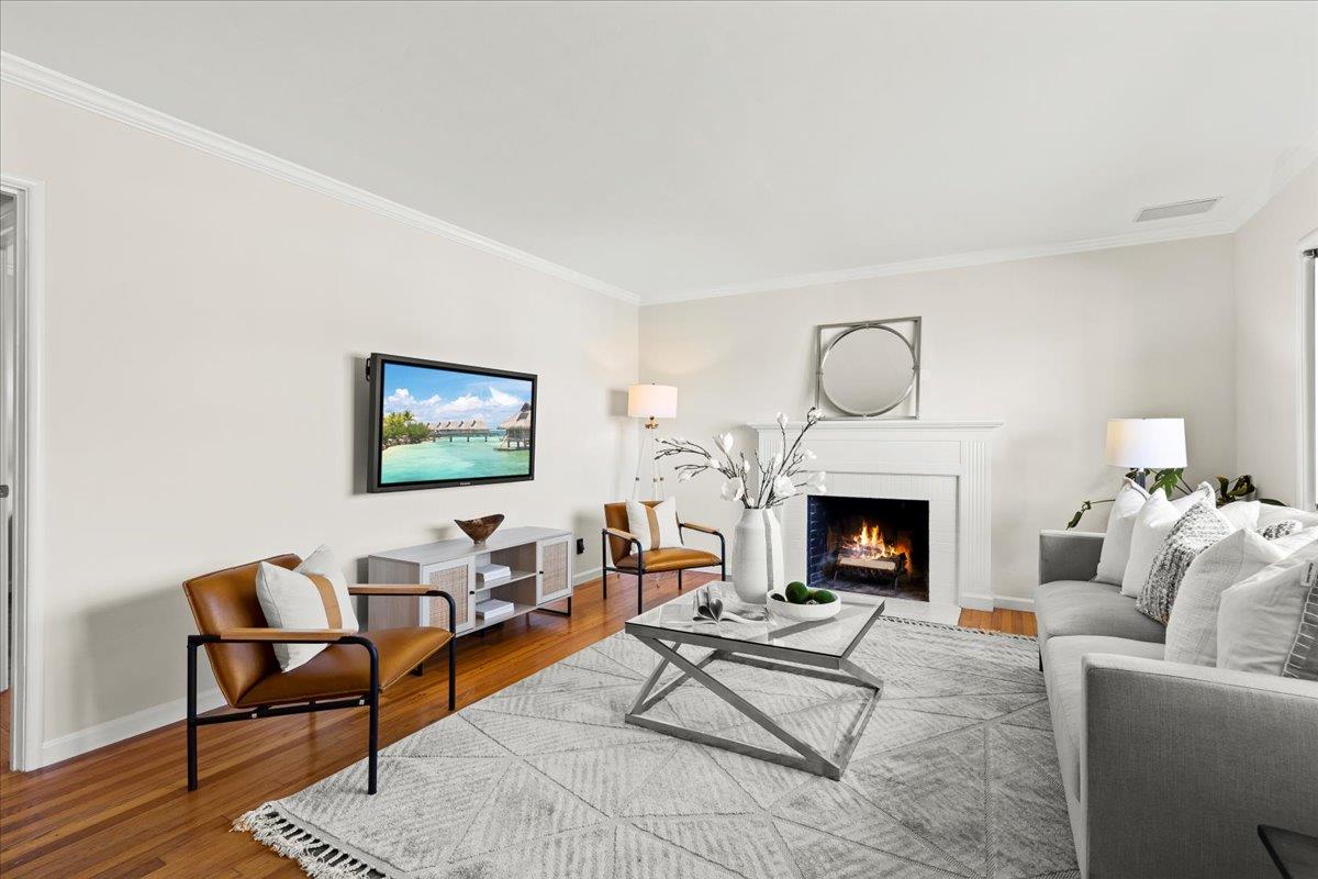 1100 Irwin Street Belmont, CA 94002 - Photo 12 of 53 a living room with furniture and a fireplace