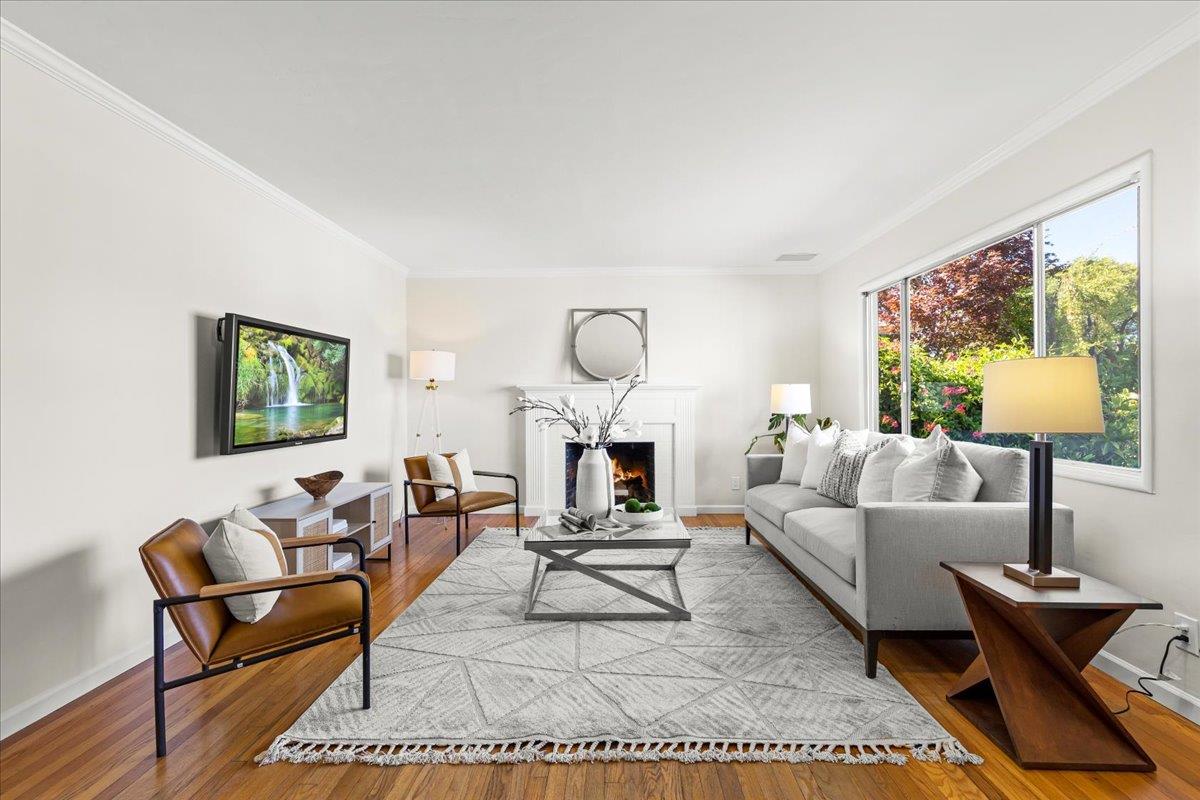 1100 Irwin Street Belmont, CA 94002 - Photo 13 of 53 a living room with furniture a rug and a lamp