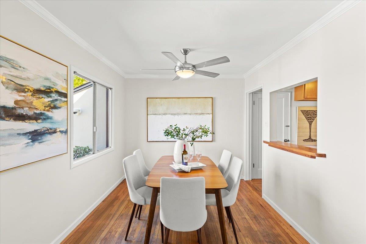 1100 Irwin Street Belmont, CA 94002 - Photo 14 of 53 a dining room with furniture a window and wooden floor