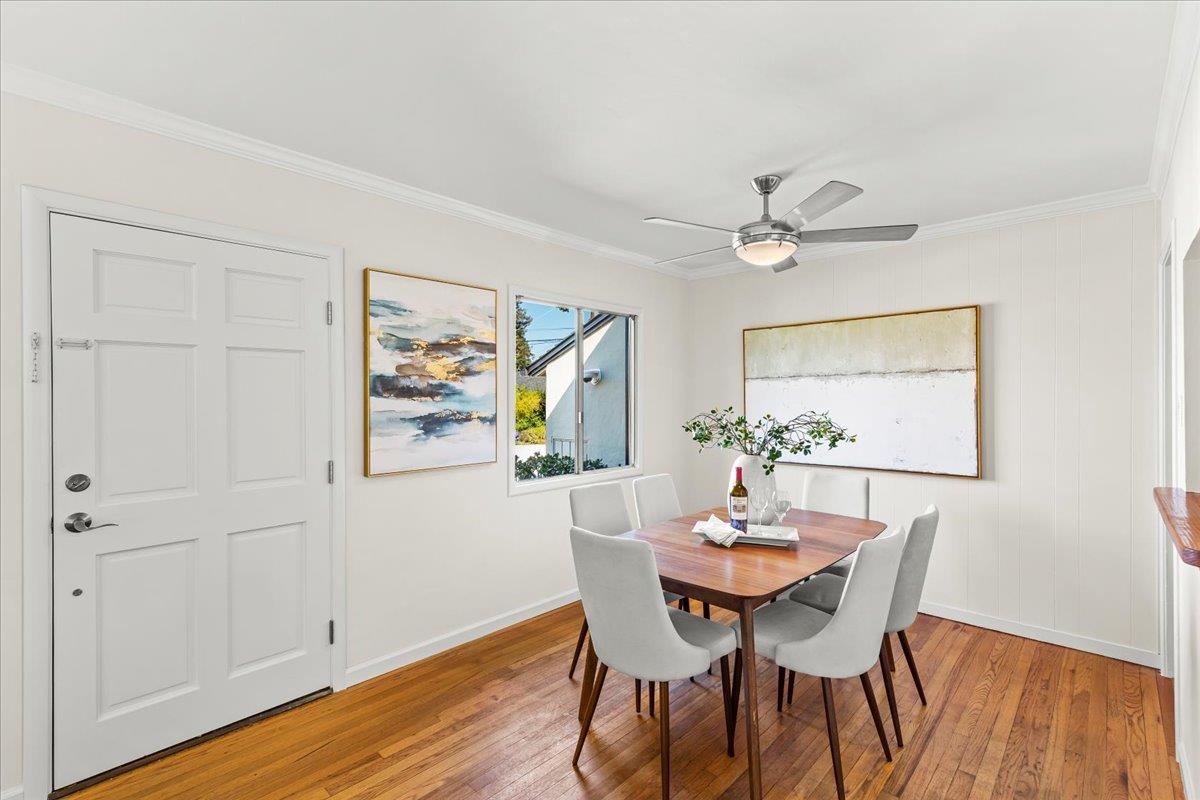 1100 Irwin Street Belmont, CA 94002 - Photo 15 of 53 a view of a dining room with furniture and wooden floor