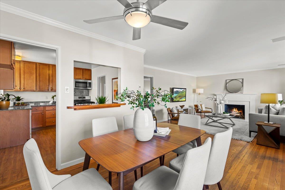 1100 Irwin Street Belmont, CA 94002 - Photo 16 of 53 a view of a dining room with furniture and wooden floor