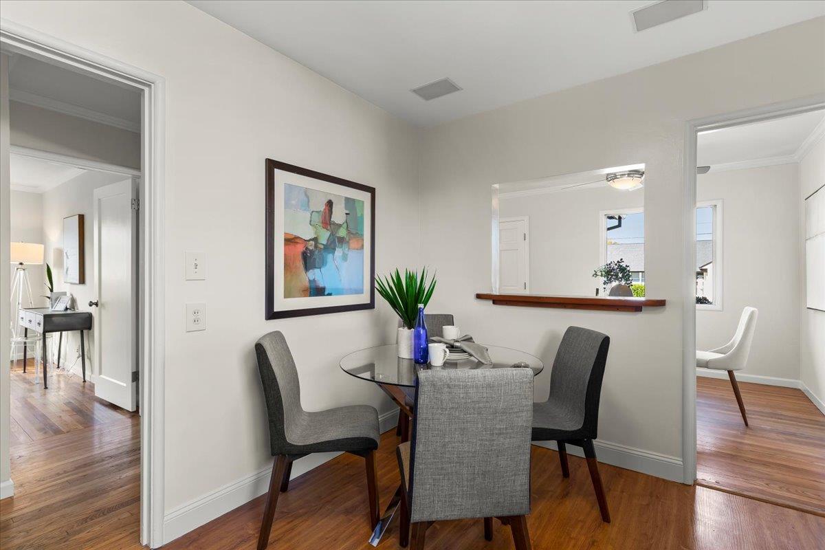 1100 Irwin Street Belmont, CA 94002 - Photo 18 of 53 a view of a dining room with furniture and wooden floor