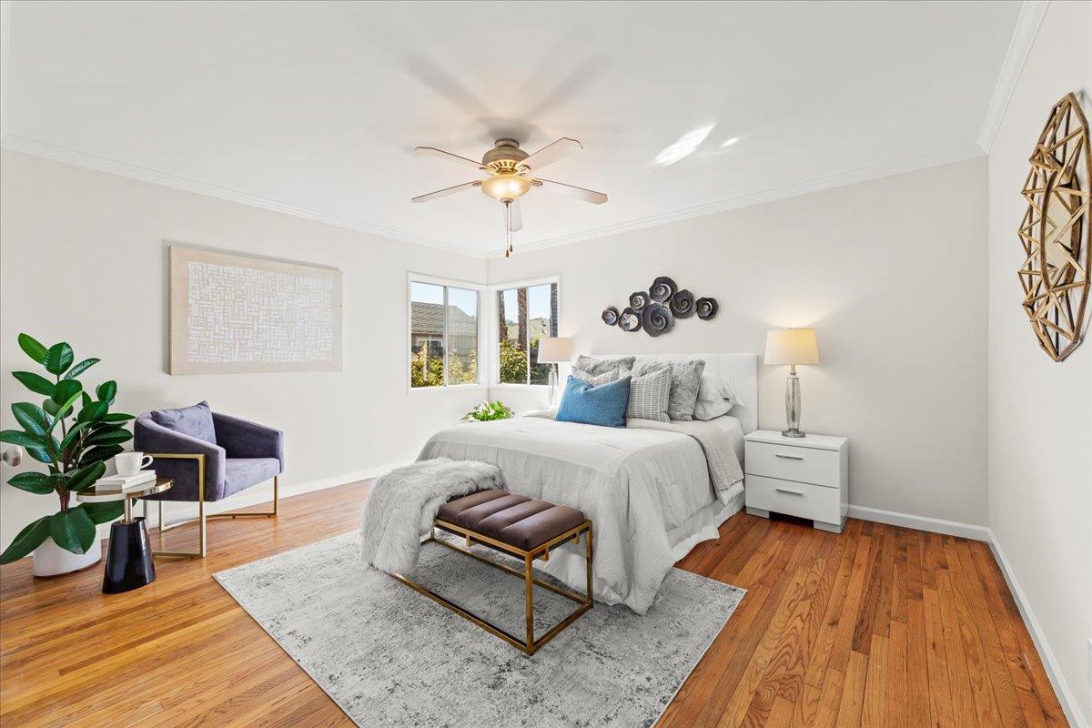 1100 Irwin Street Belmont, CA 94002 - Photo 23 of 53 a bedroom with bed and a potted plant on dresser