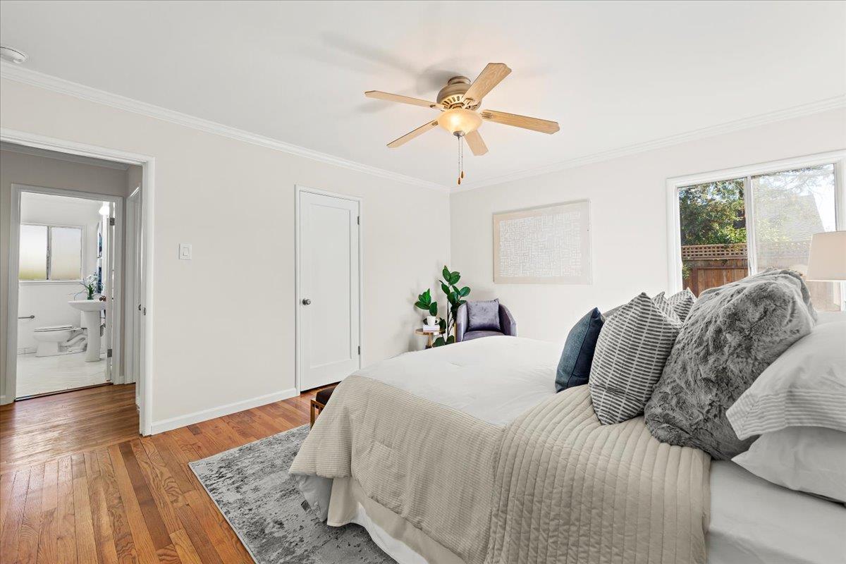 1100 Irwin Street Belmont, CA 94002 - Photo 24 of 53 a bedroom with a bed and wooden floor