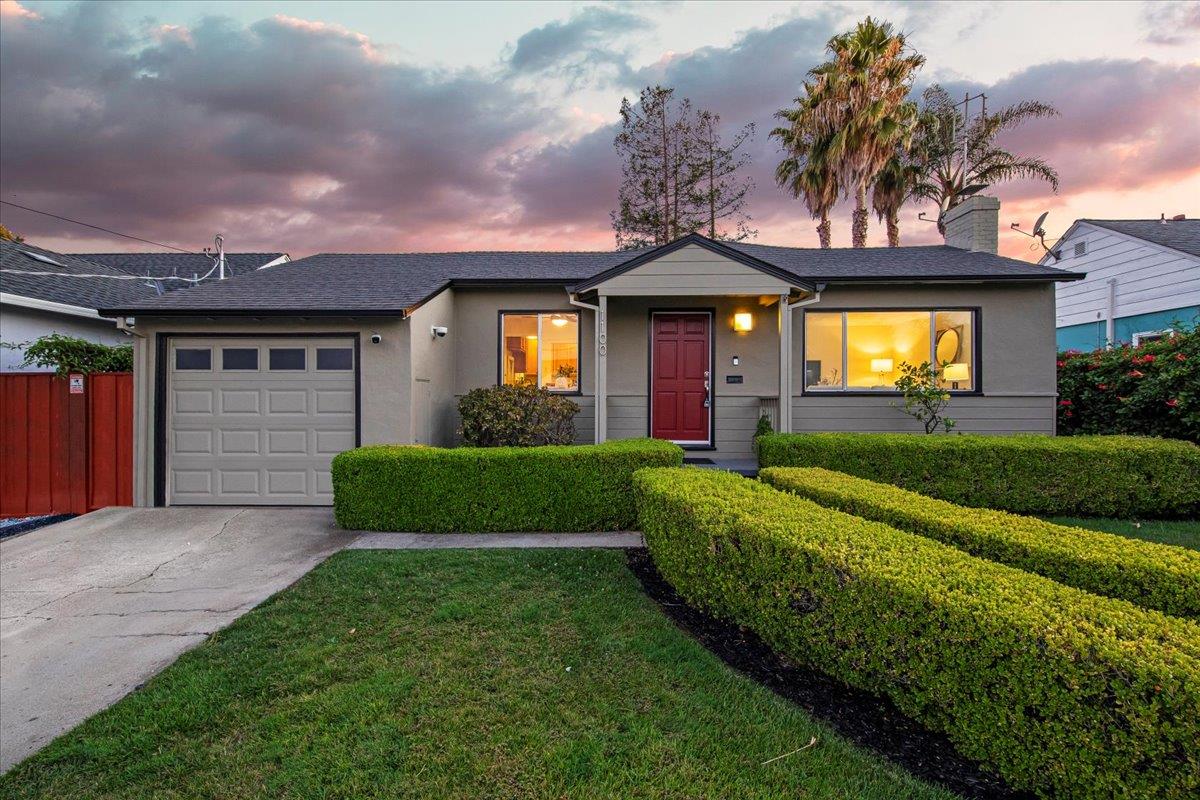 1100 Irwin Street Belmont, CA 94002 - Photo 4 of 53 a front view of a house with a garden