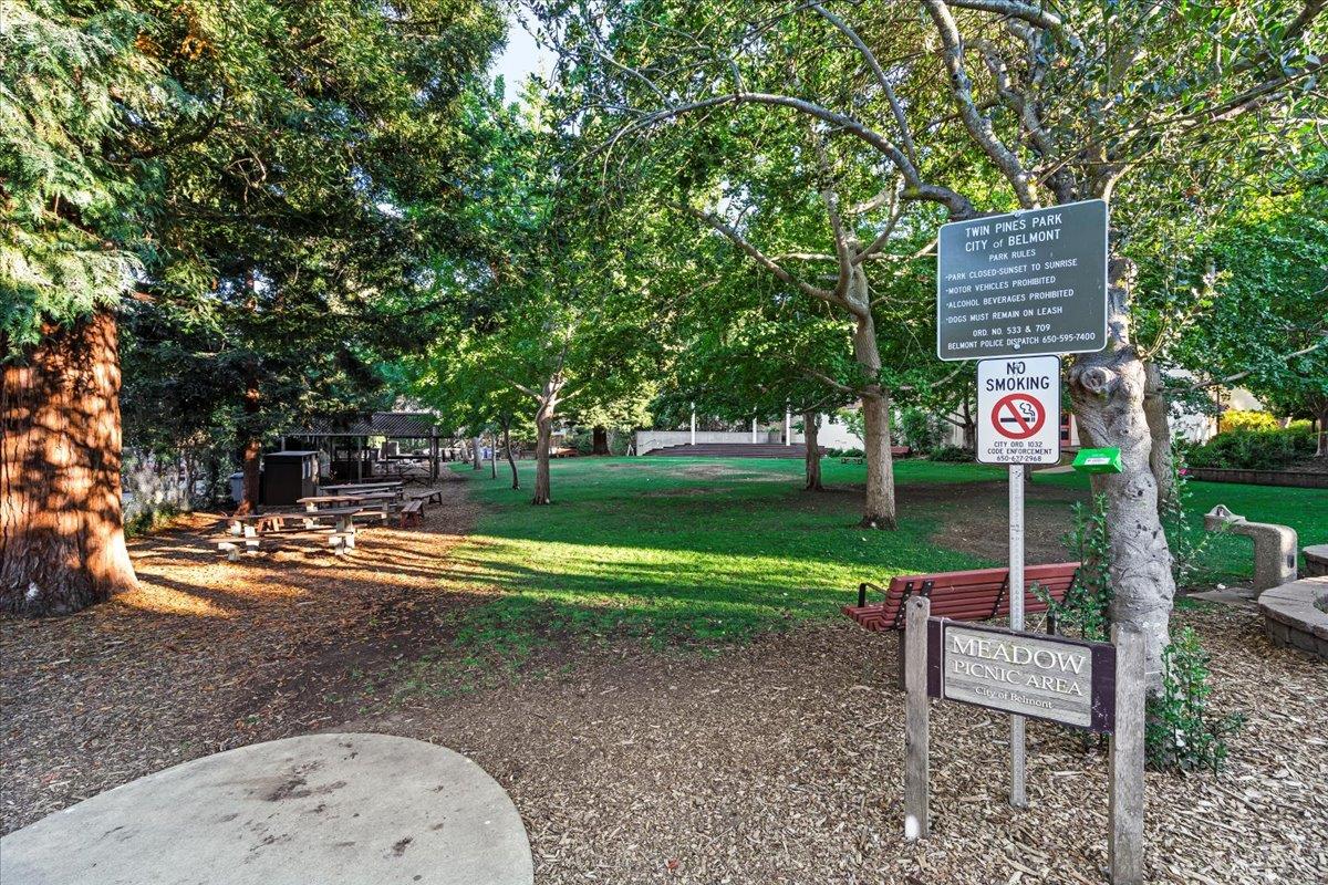 1100 Irwin Street Belmont, CA 94002 - Photo 48 of 53 a sign board with a play ground in front of the house