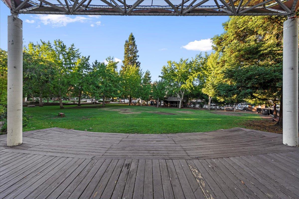 1100 Irwin Street Belmont, CA 94002 - Photo 51 of 53 a view of a golf course with wooden fence