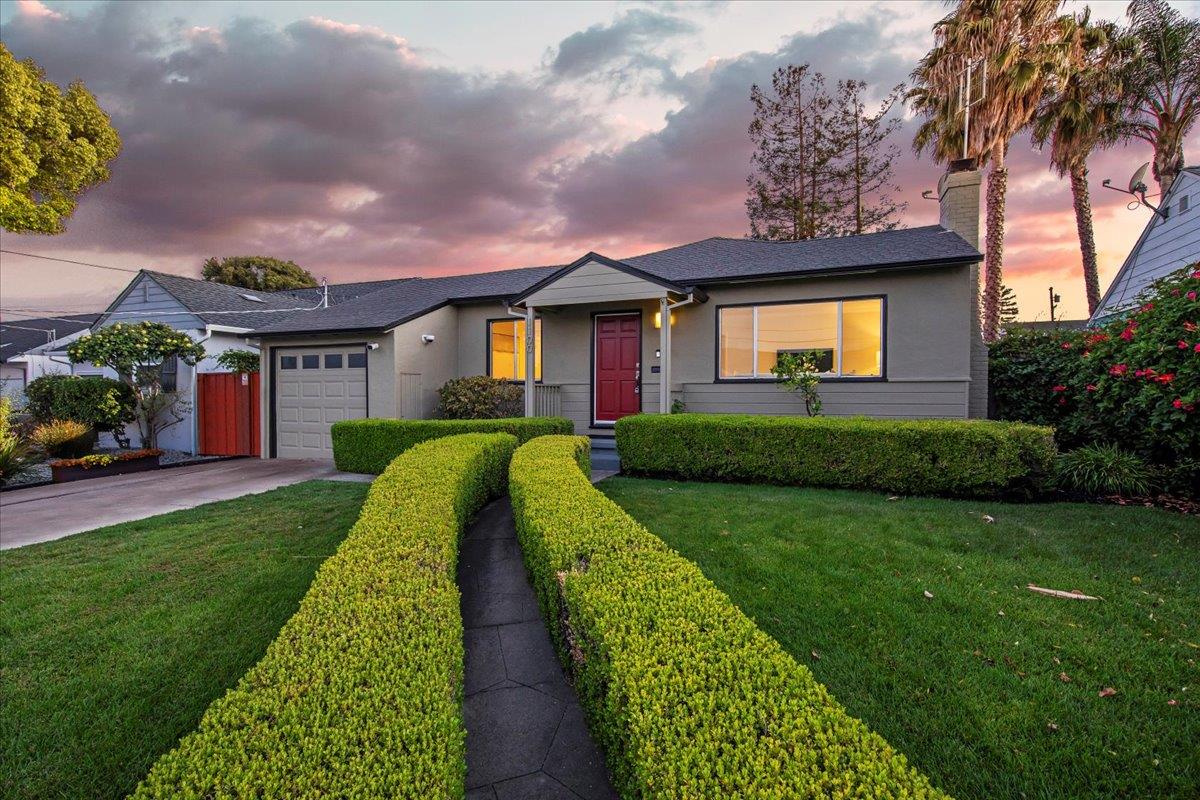 1100 Irwin Street Belmont, CA 94002 - Photo 8 of 53 a front view of a house with a yard
