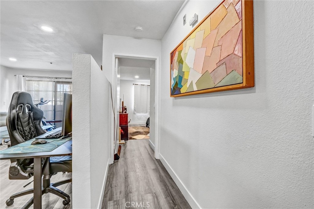 6545 Reseda Boulevard, Unit 6 Reseda, CA 91335 - Photo 15 of 32 a view of a hallway with workspace
