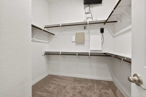 a view of a room with rack on the wall