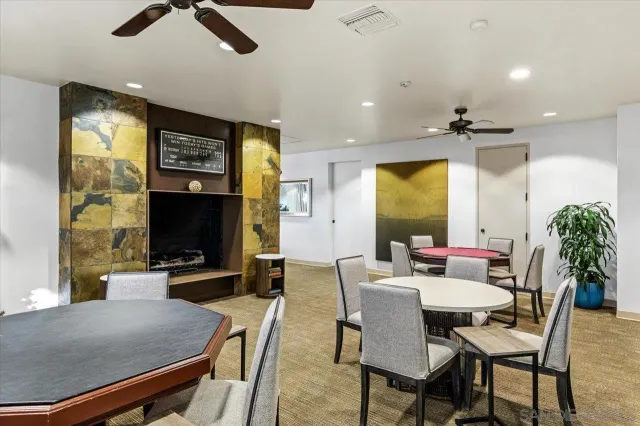 a living room with furniture and flat screen tv
