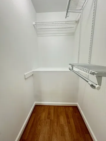 a bathroom with a double vanity sink mirror vanity and toilet