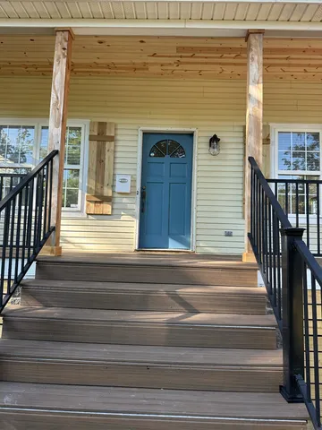 a view of a entryway door front of house