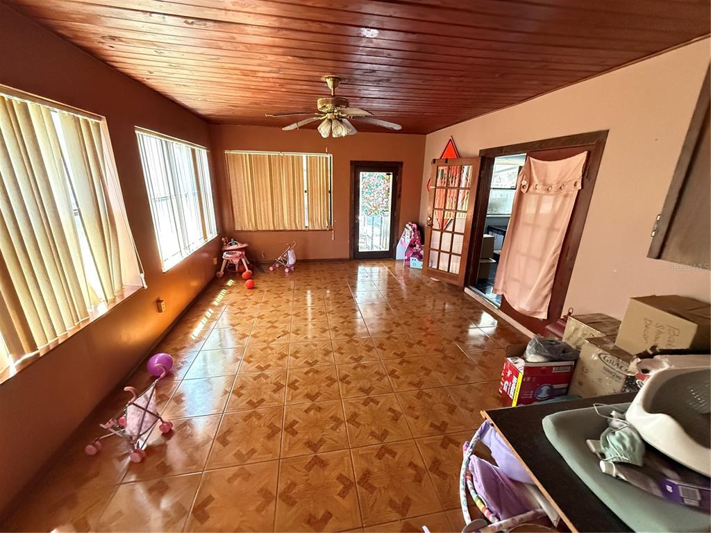 460 West Pierce Street Lake Alfred, FL 33850 - Photo 12 of 41 a room with wooden floor and furniture