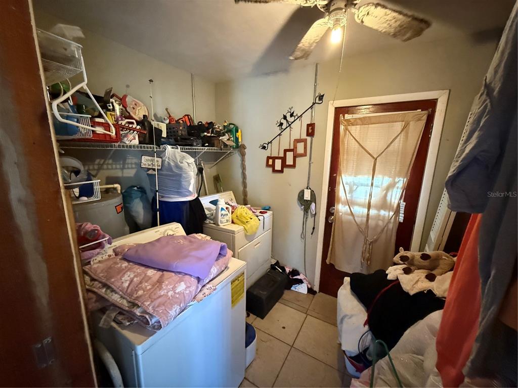 460 West Pierce Street Lake Alfred, FL 33850 - Photo 13 of 41 a room with storage and utility