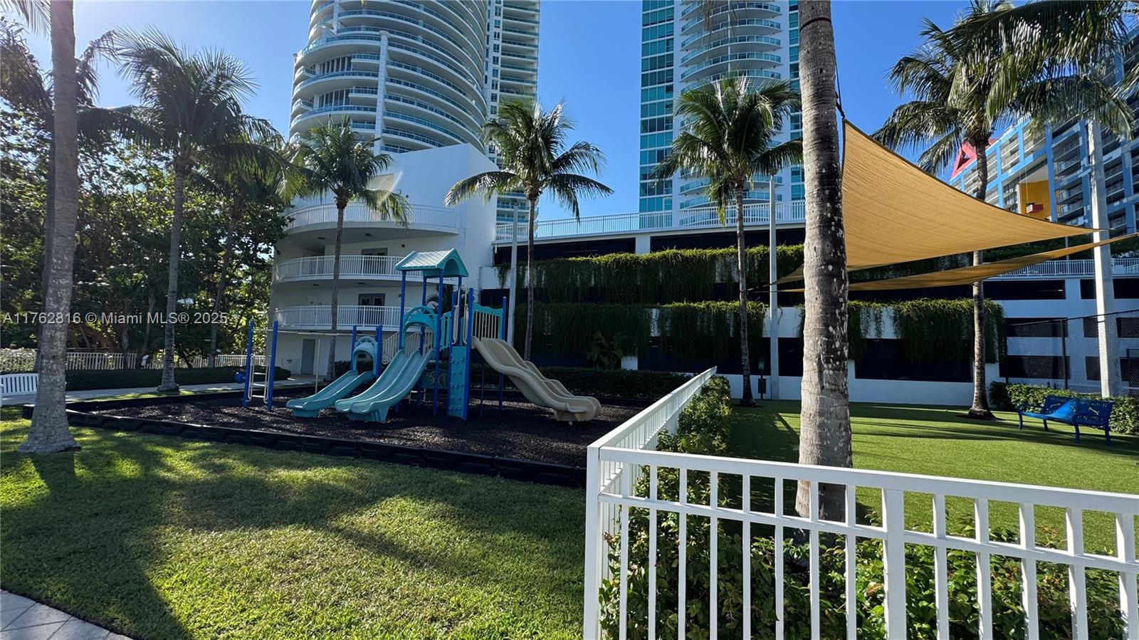 2101 Brickell Avenue, Unit 1012 Miami, FL 33129 - Photo 14 of 40 a view of house with swimming pool and porch