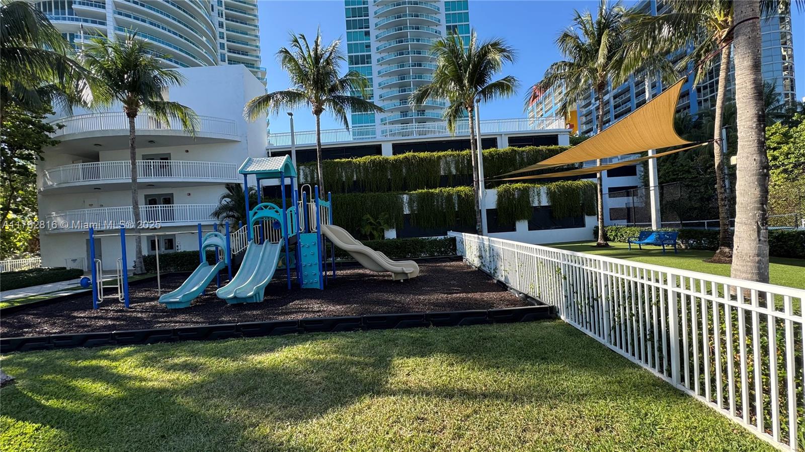 2101 Brickell Avenue, Unit 1012 Miami, FL 33129 - Photo 15 of 40 a view of a house with backyard and swimming pool