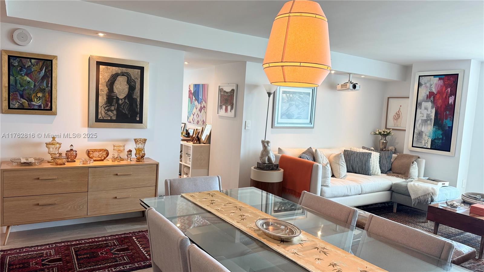 2101 Brickell Avenue, Unit 1012 Miami, FL 33129 - Photo 28 of 40 a living room with furniture and a window