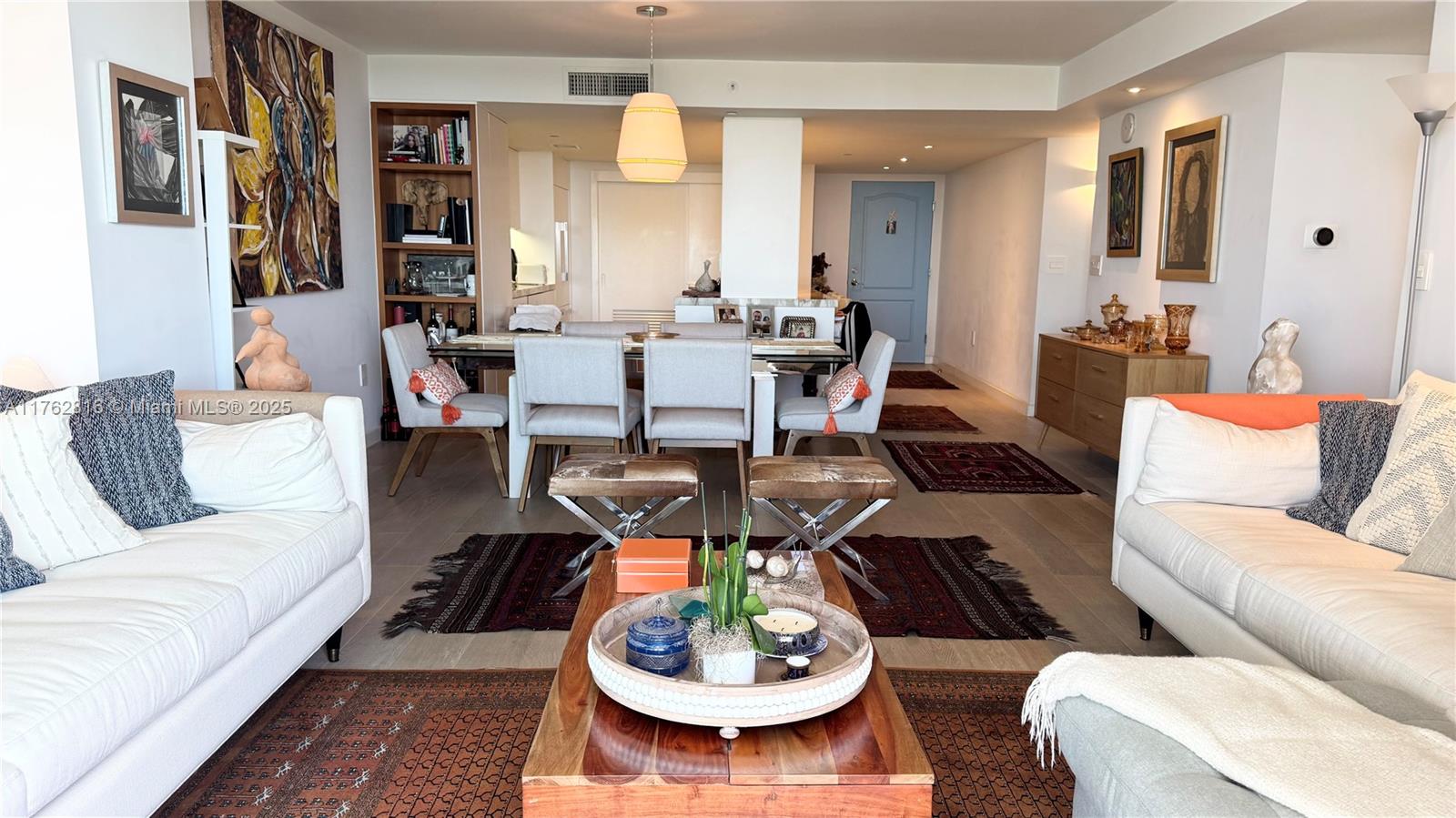 2101 Brickell Avenue, Unit 1012 Miami, FL 33129 - Photo 33 of 40 a living room with furniture and a table