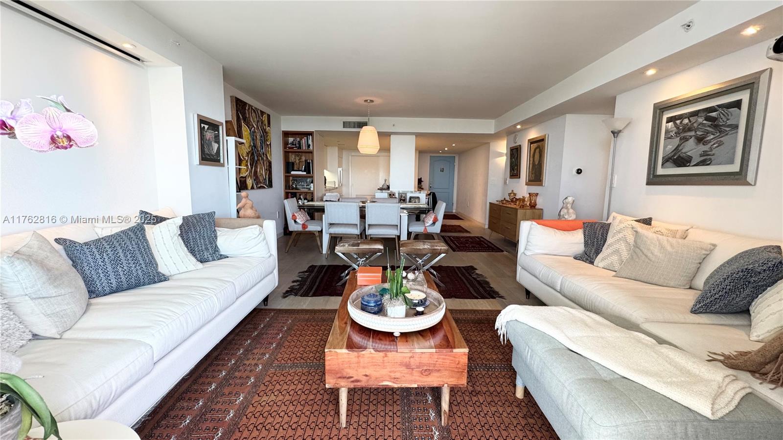 2101 Brickell Avenue, Unit 1012 Miami, FL 33129 - Photo 34 of 40 a living room with furniture and a large window