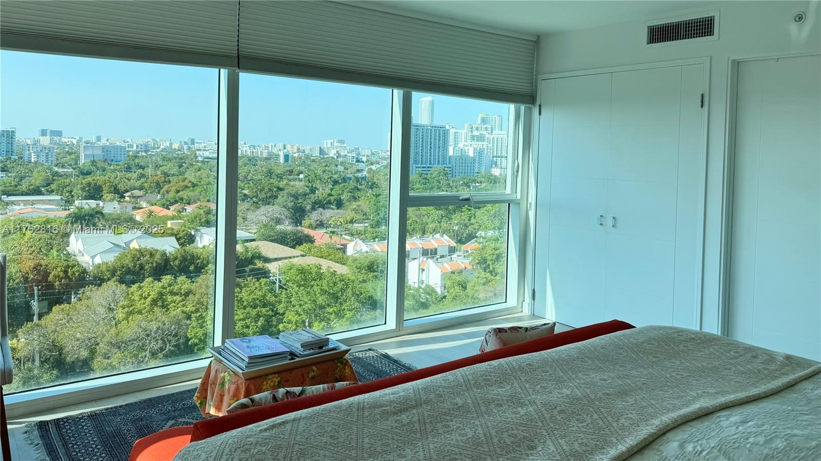2101 Brickell Avenue, Unit 1012 Miami, FL 33129 - Photo 40 of 40 a bedroom with a bed and a large window