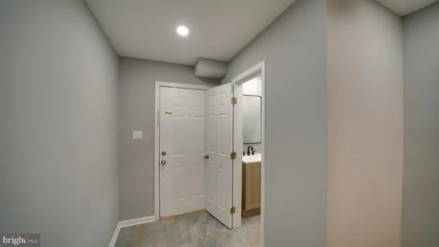 a bathroom with a sink and mirror