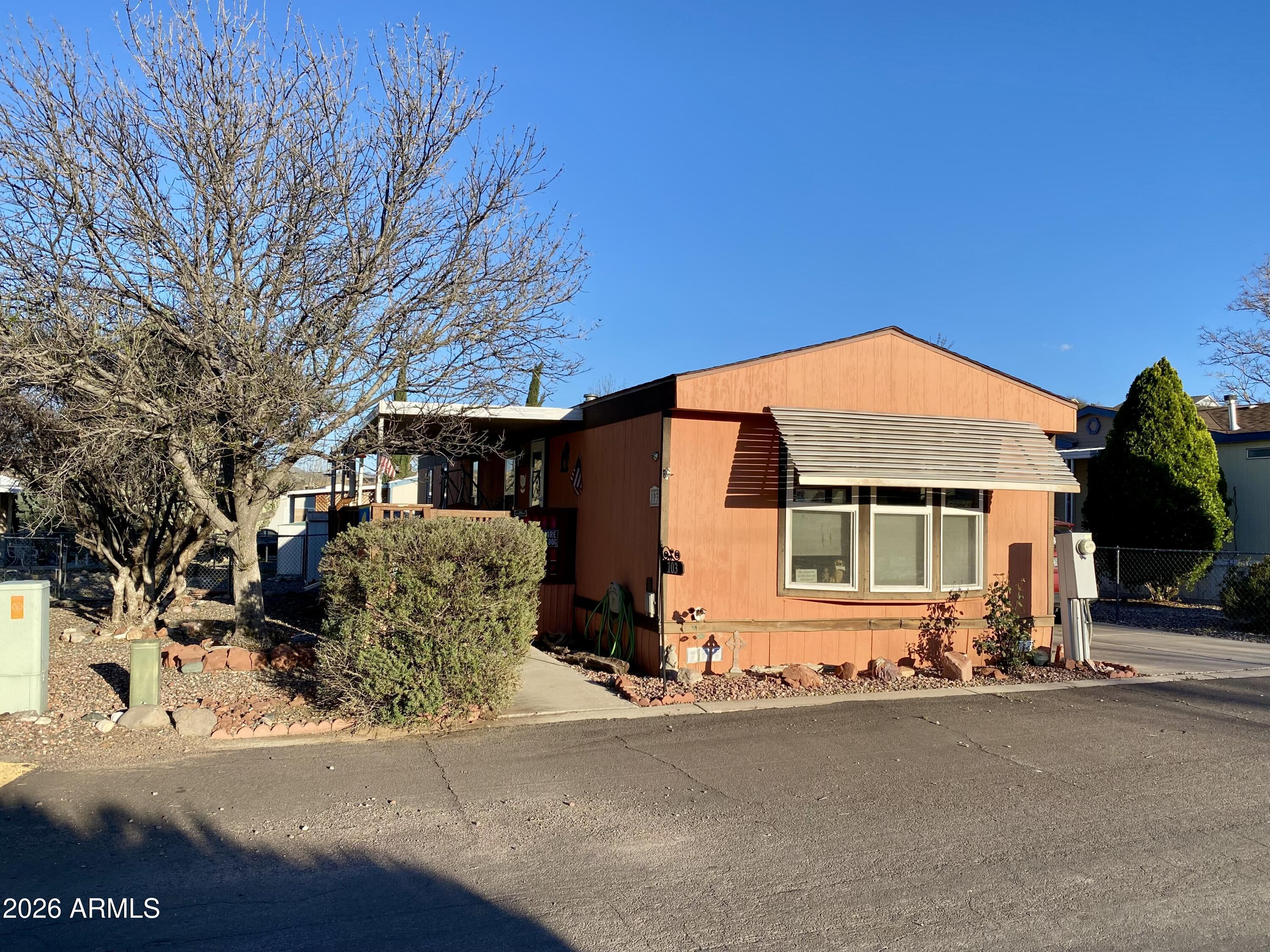 front view of a house with a street