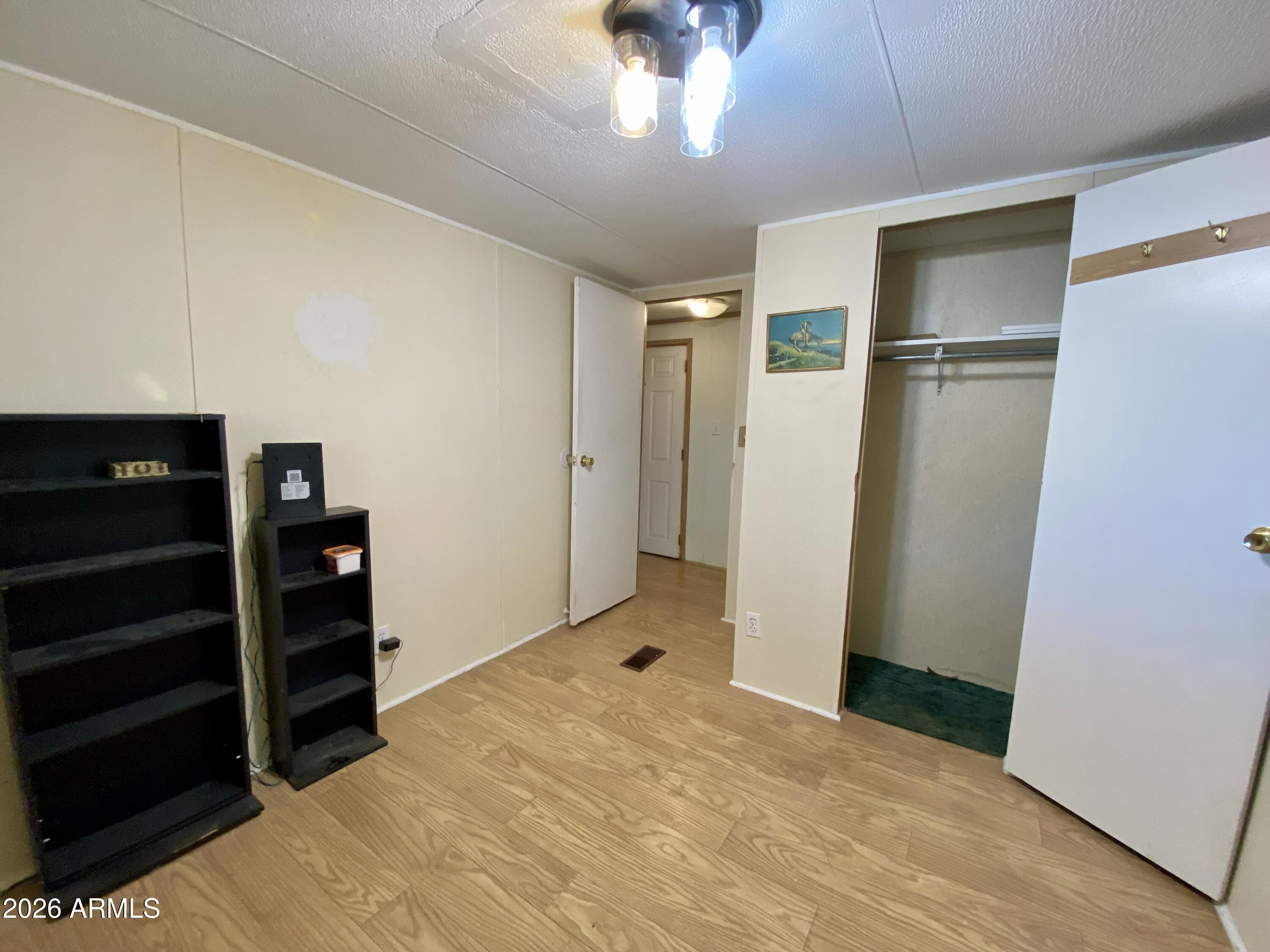 723 Finnie Flat Road, Unit 103 Camp Verde, AZ 86322 - Photo 20 of 41 a view of an empty room with cabinet and a window