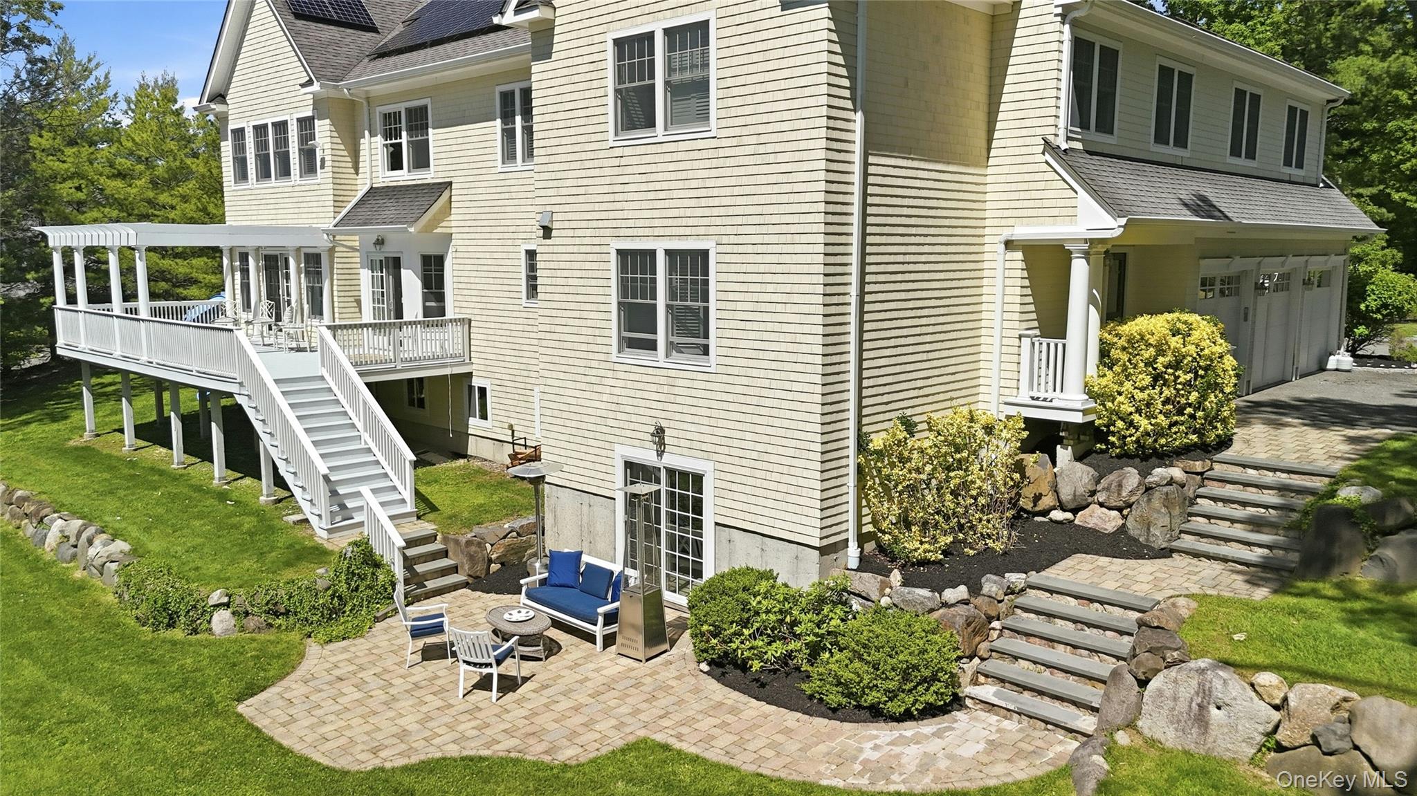 1330 Ridge Road Laurel Hollow, NY 11791 - Photo 39 of 47 Outside Patio. Basement w Walk Out