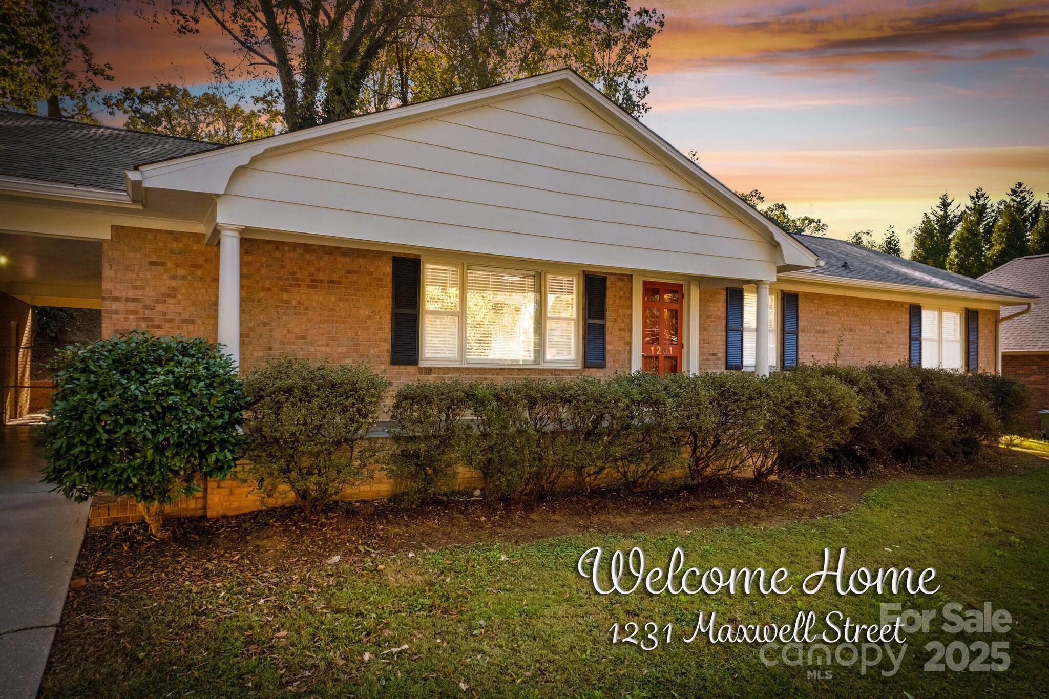 1231 Maxwell Street Salisbury, NC 28144 - Photo 1 of 42 a front view of a house with a garden