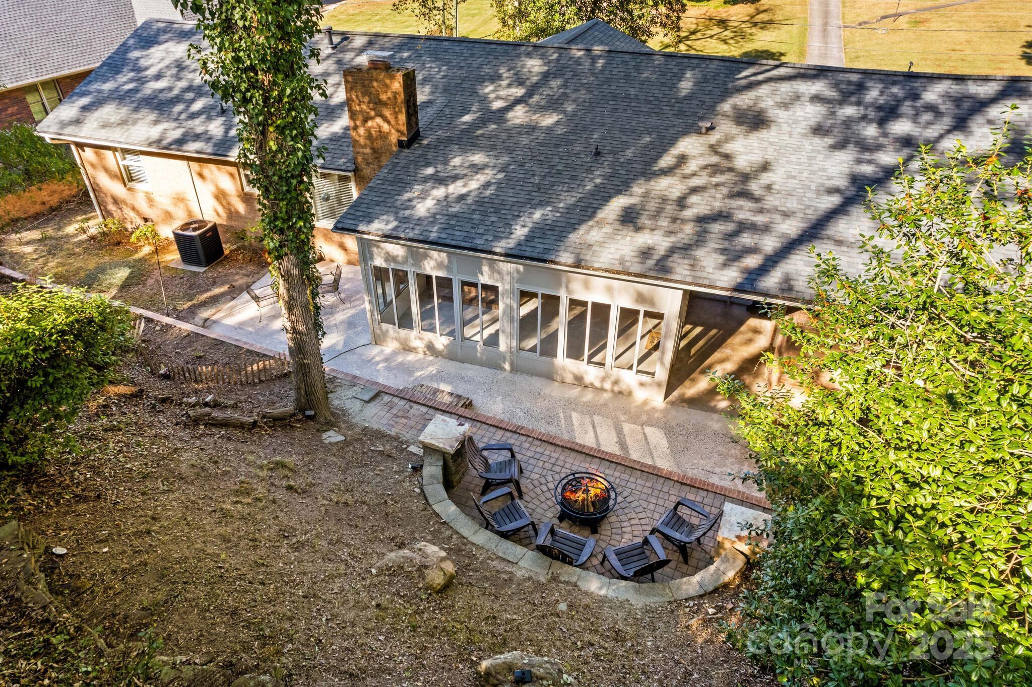 1231 Maxwell Street Salisbury, NC 28144 - Photo 30 of 42 a view of roof deck with two chairs and potted plants