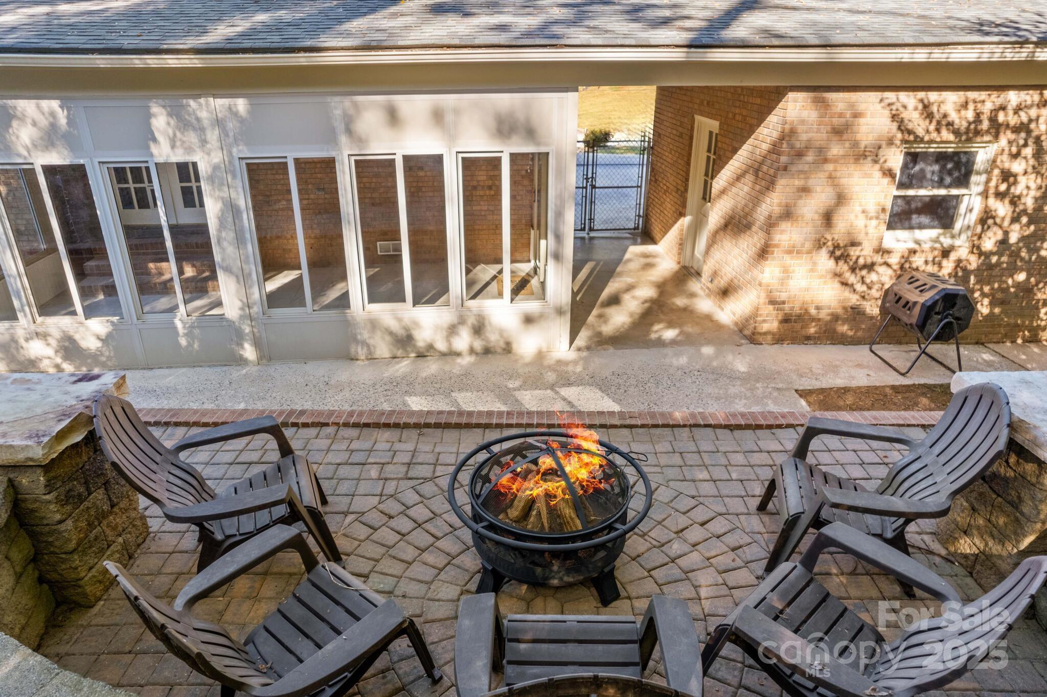 1231 Maxwell Street Salisbury, NC 28144 - Photo 32 of 42 a view of a chairs and table in the patio