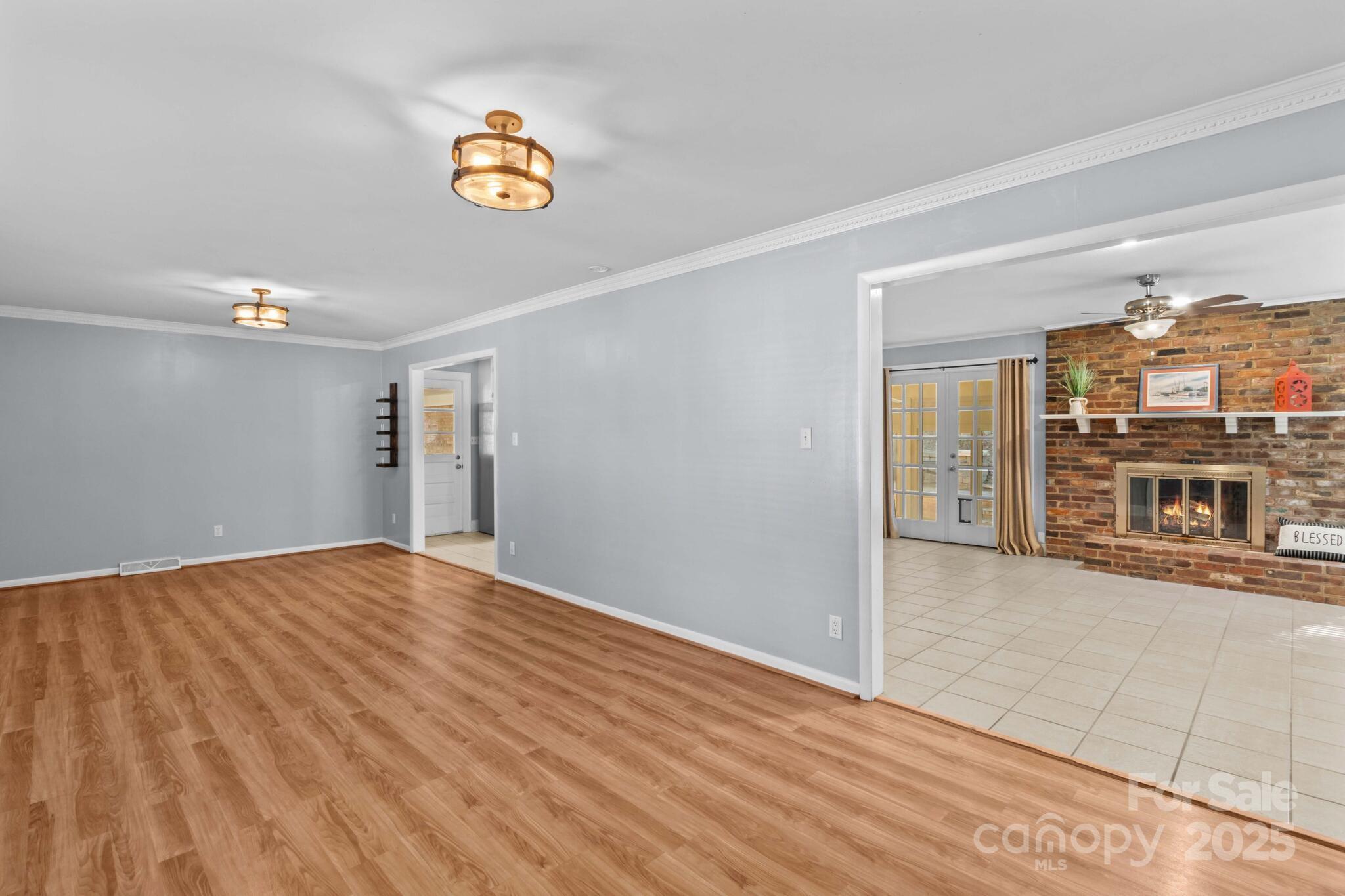 1231 Maxwell Street Salisbury, NC 28144 - Photo 8 of 42 a view of an empty room and a kitchen view