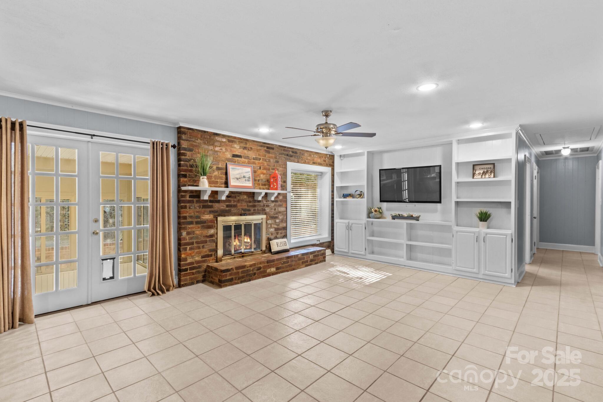 1231 Maxwell Street Salisbury, NC 28144 - Photo 9 of 42 a view of a livingroom with furniture and a flat screen tv