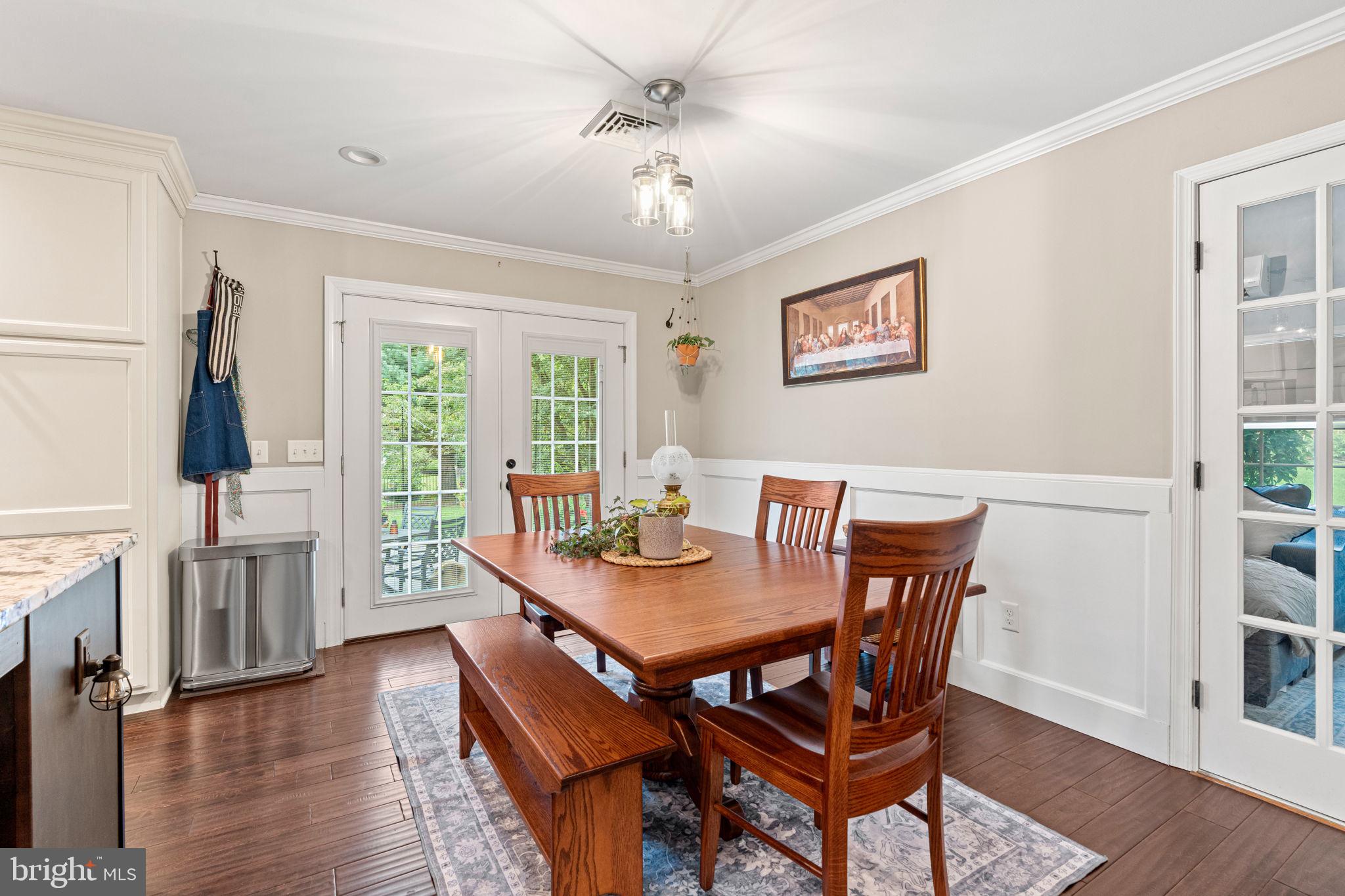 205 East Glenn Road Hershey, PA 17033 - Photo 15 of 52 a view of a dining room with furniture window and wooden floor