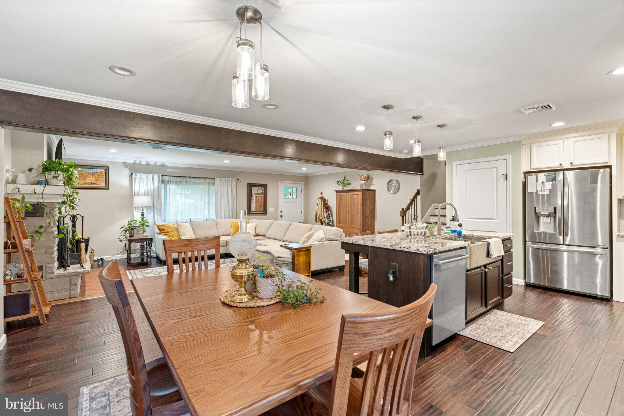 205 East Glenn Road Hershey, PA 17033 - Photo 17 of 52 a view of a dining room with furniture a chandelier and wooden floor