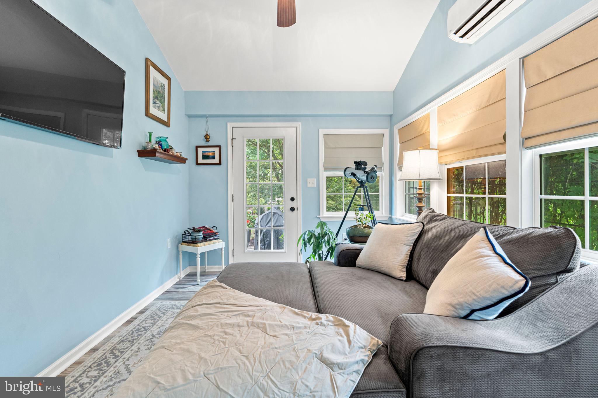205 East Glenn Road Hershey, PA 17033 - Photo 18 of 52 a bedroom with furniture and large windows