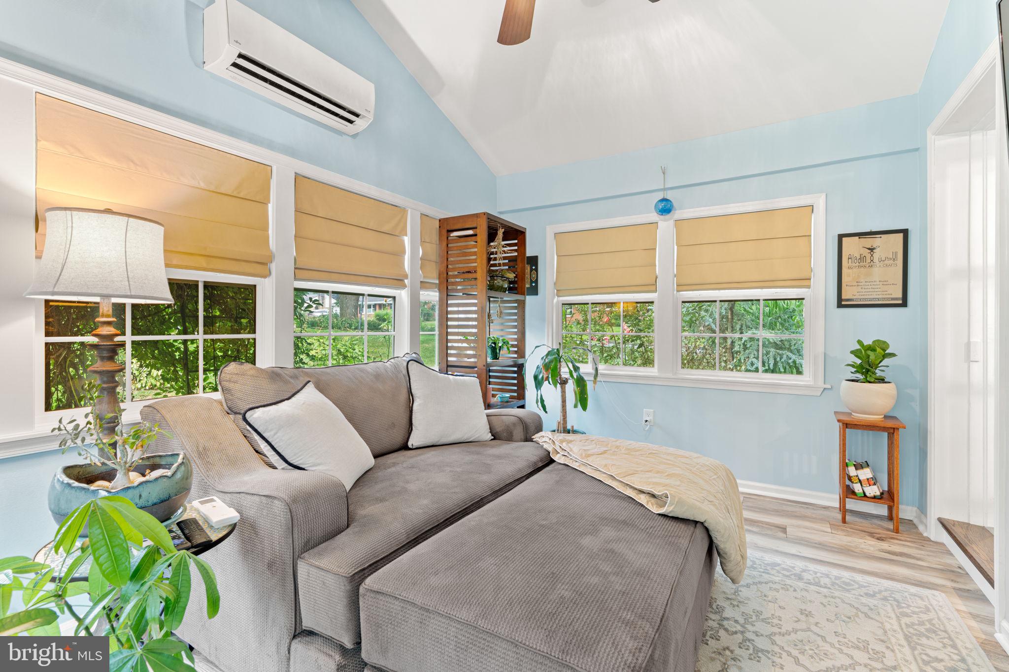 205 East Glenn Road Hershey, PA 17033 - Photo 20 of 52 a living room with furniture and large windows