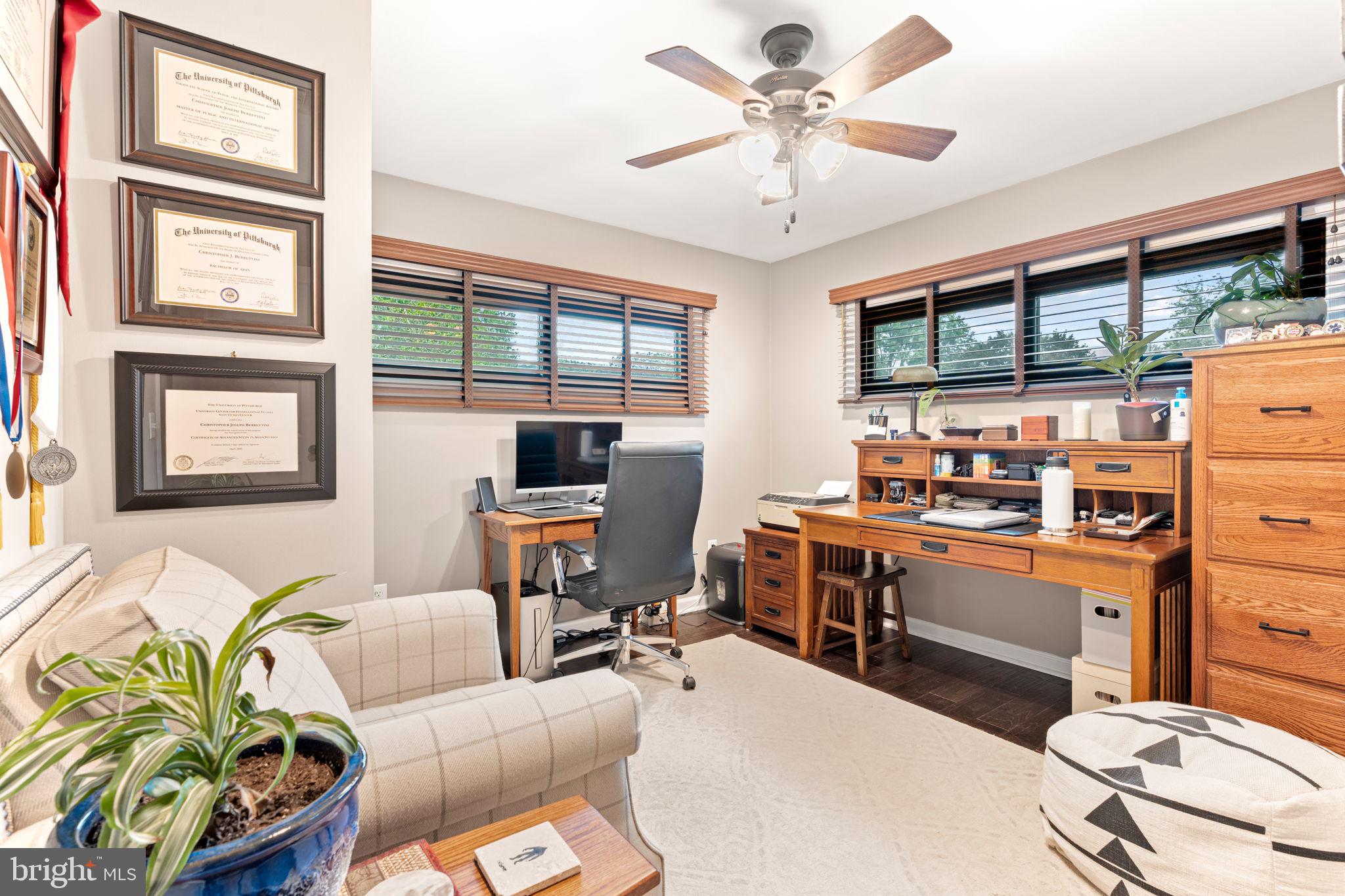 205 East Glenn Road Hershey, PA 17033 - Photo 21 of 52 a living room with furniture fireplace and a window