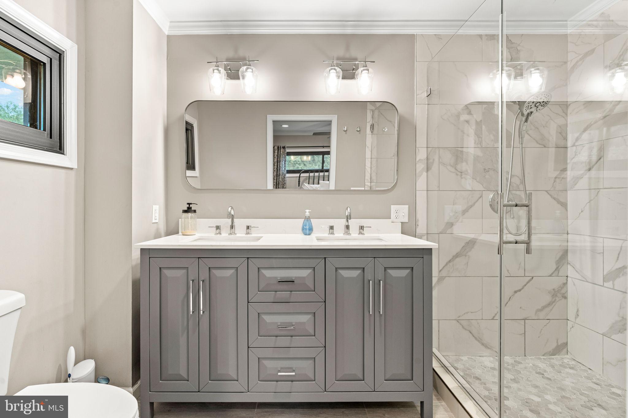 205 East Glenn Road Hershey, PA 17033 - Photo 26 of 52 a bathroom with a double vanity sink mirror and toilet