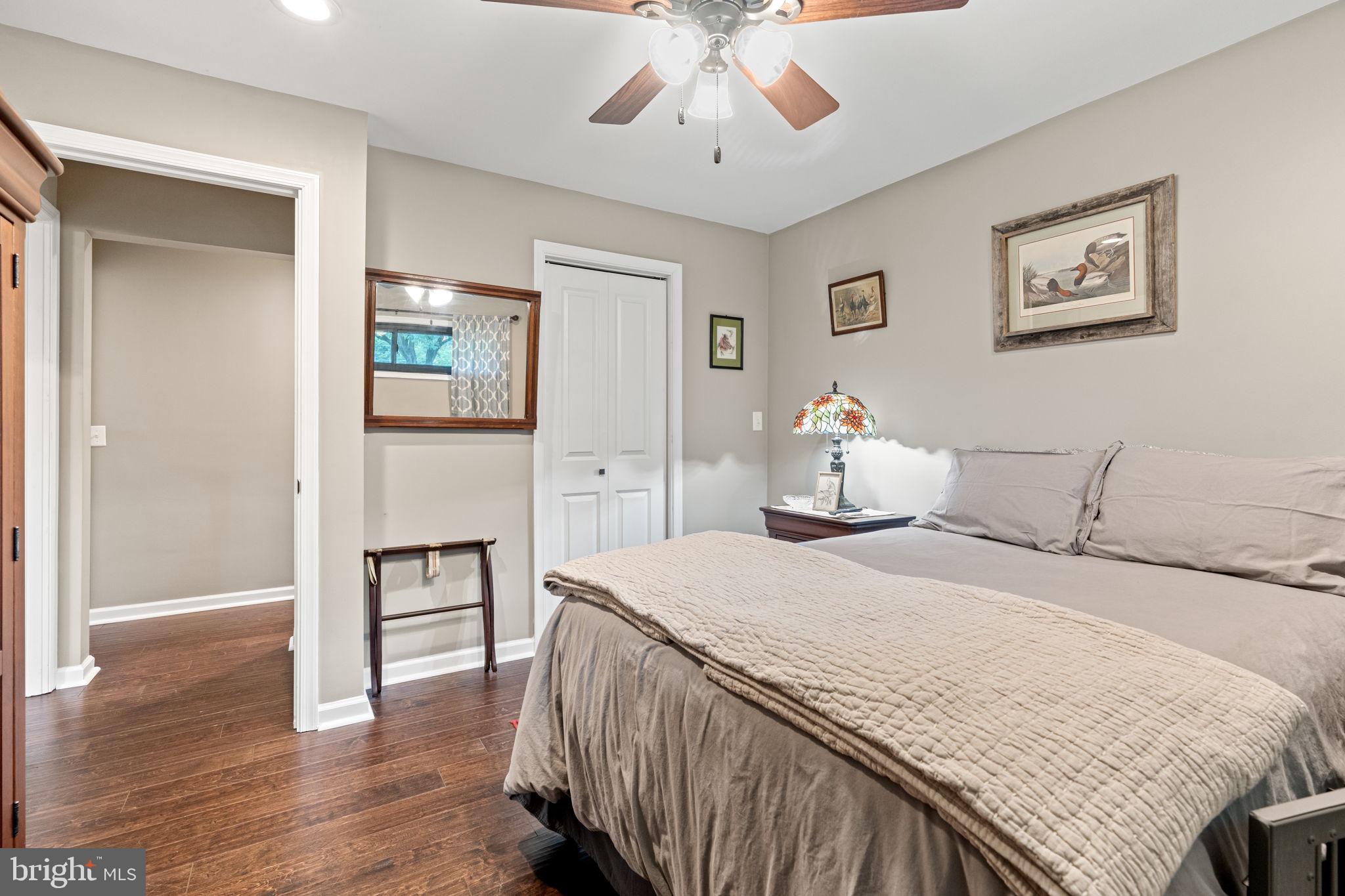 205 East Glenn Road Hershey, PA 17033 - Photo 29 of 52 a bedroom with a bed and wooden floor