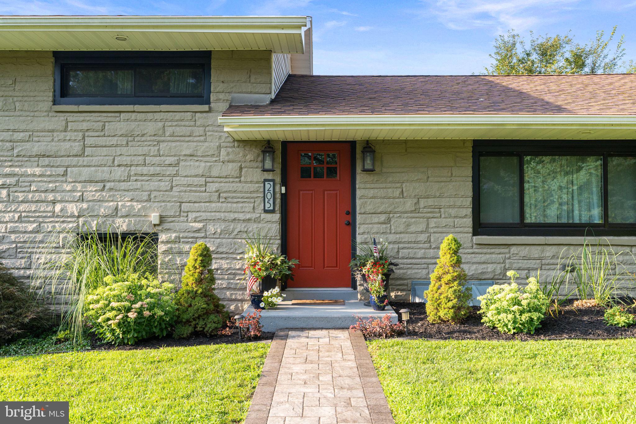 205 East Glenn Road Hershey, PA 17033 - Photo 3 of 52 a front view of a house with a yard