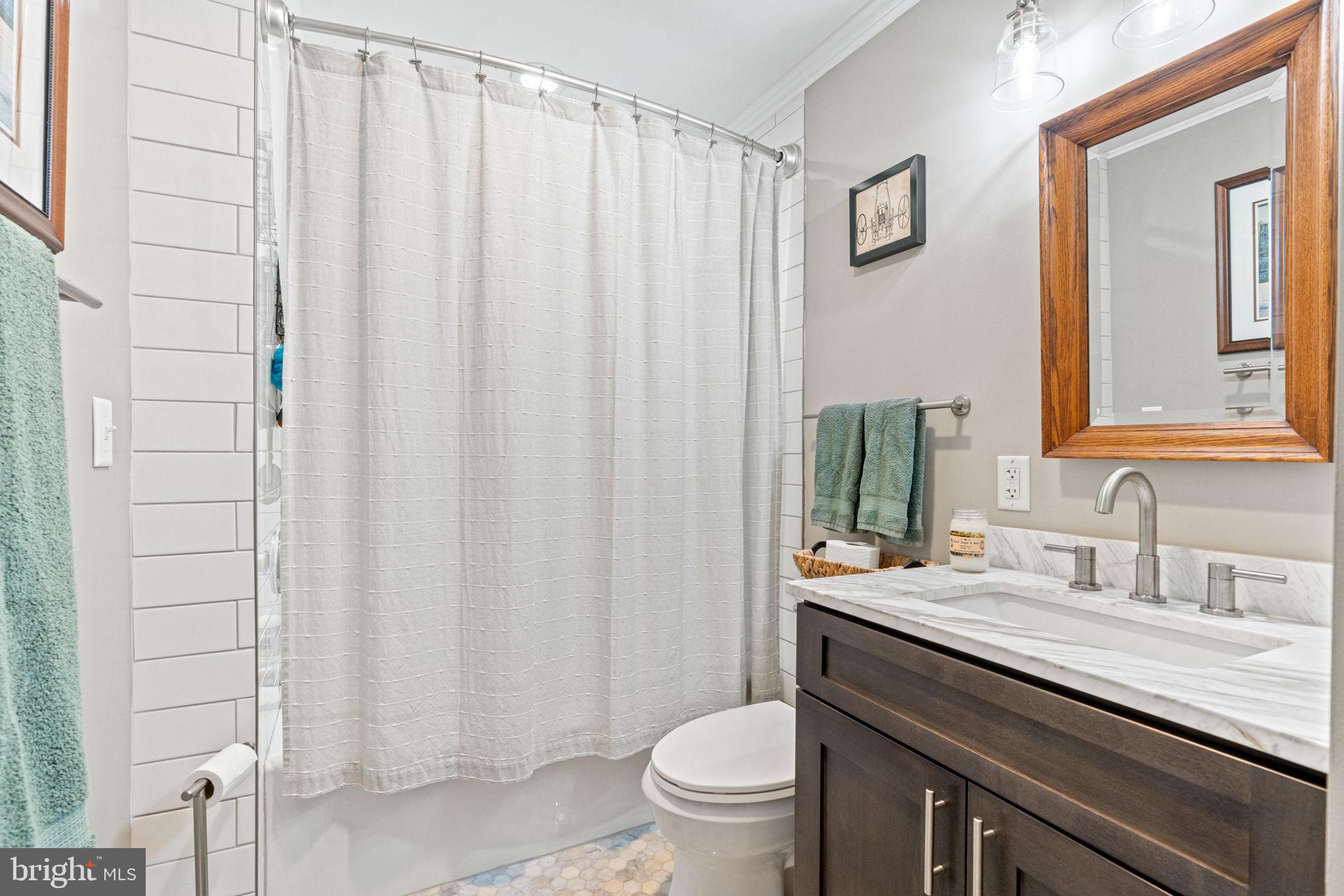205 East Glenn Road Hershey, PA 17033 - Photo 31 of 52 a bathroom with a granite countertop sink and a mirror