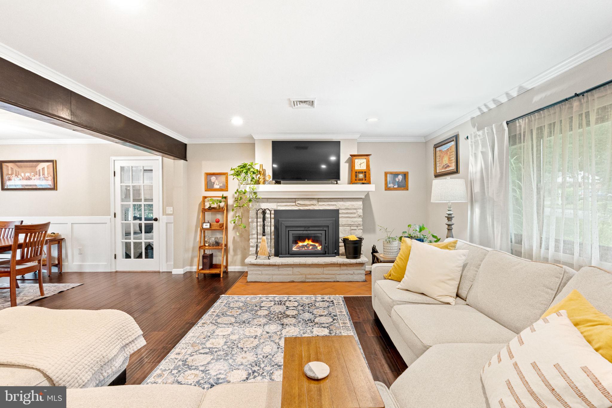 205 East Glenn Road Hershey, PA 17033 - Photo 4 of 52 a living room with furniture and a fireplace