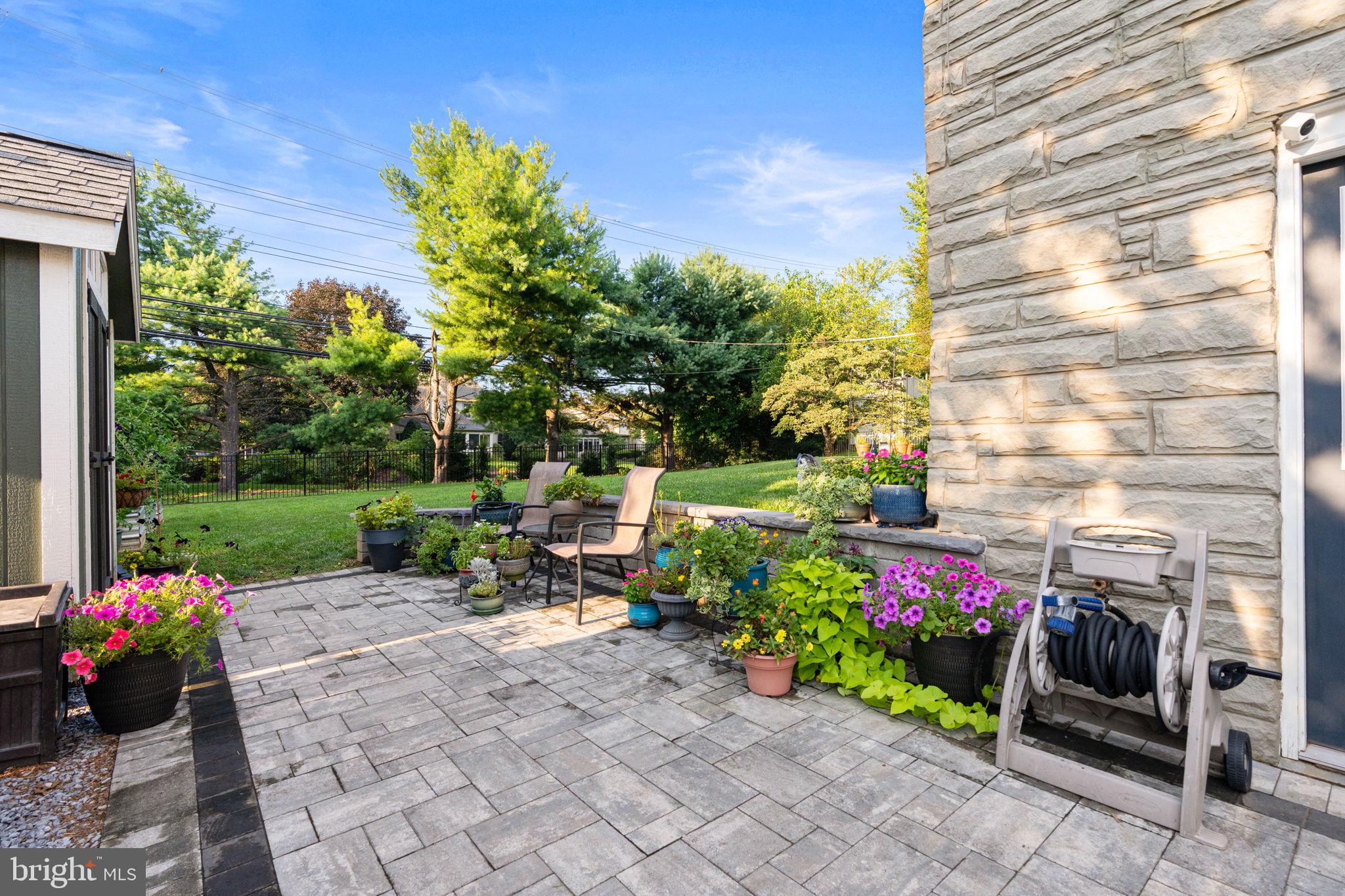 205 East Glenn Road Hershey, PA 17033 - Photo 42 of 52 a view of a table and chairs in back yard of the house