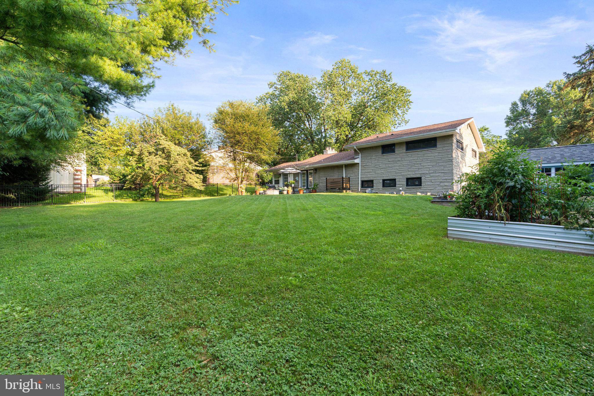 205 East Glenn Road Hershey, PA 17033 - Photo 45 of 52 a view of a house with a yard