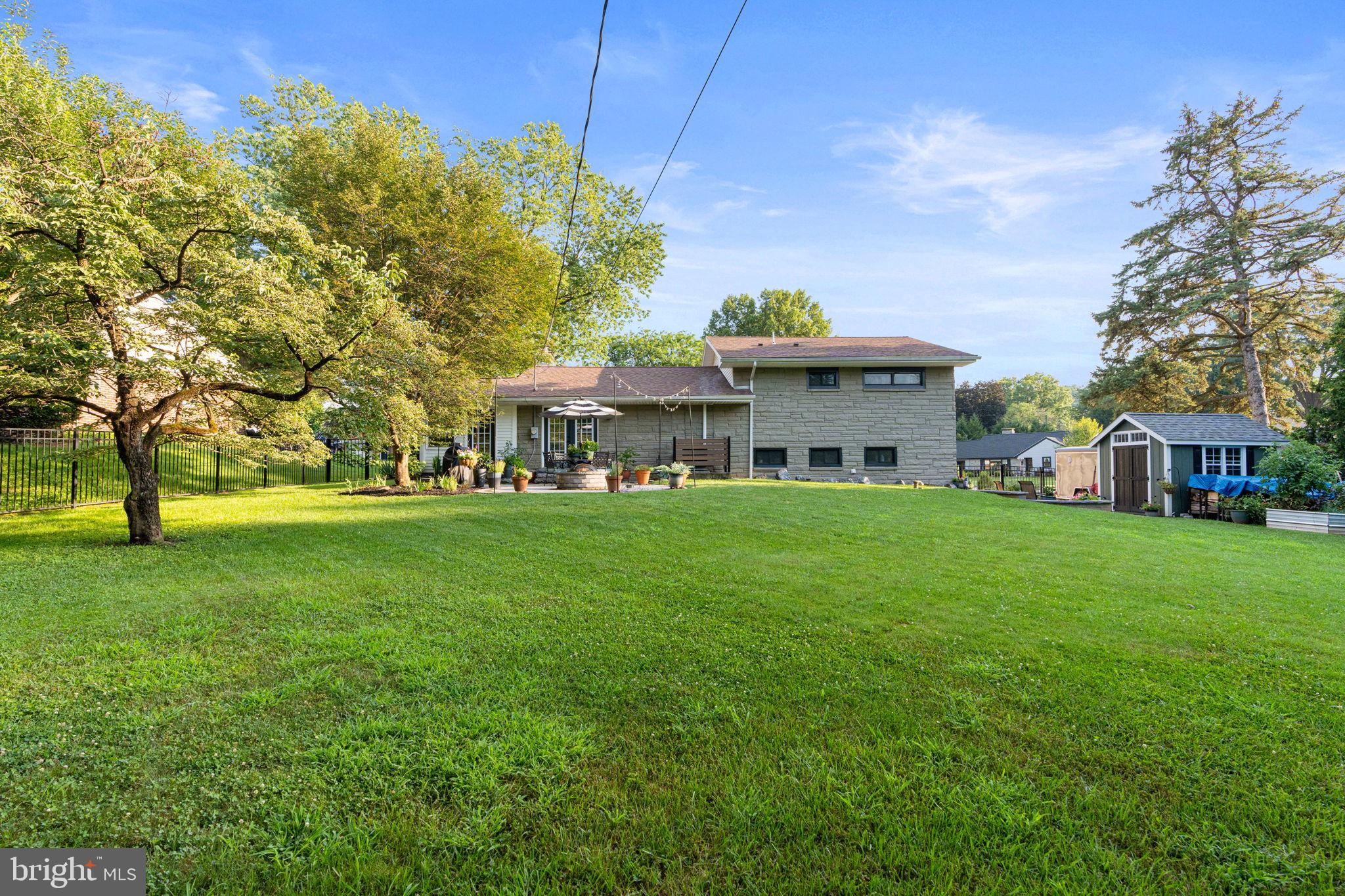 205 East Glenn Road Hershey, PA 17033 - Photo 47 of 52 a front view of a house with a garden