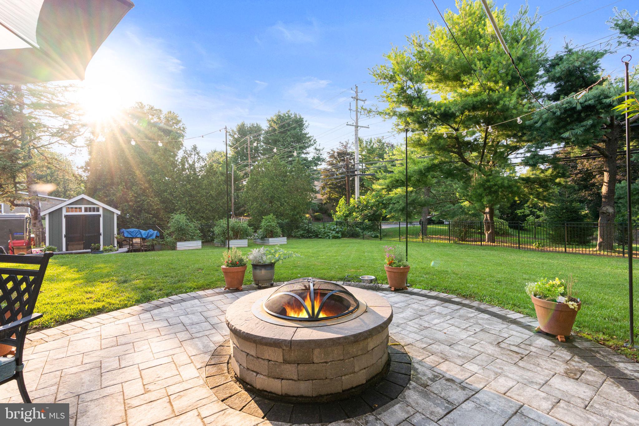 205 East Glenn Road Hershey, PA 17033 - Photo 52 of 52 a view of a house with backyard sitting area and garden