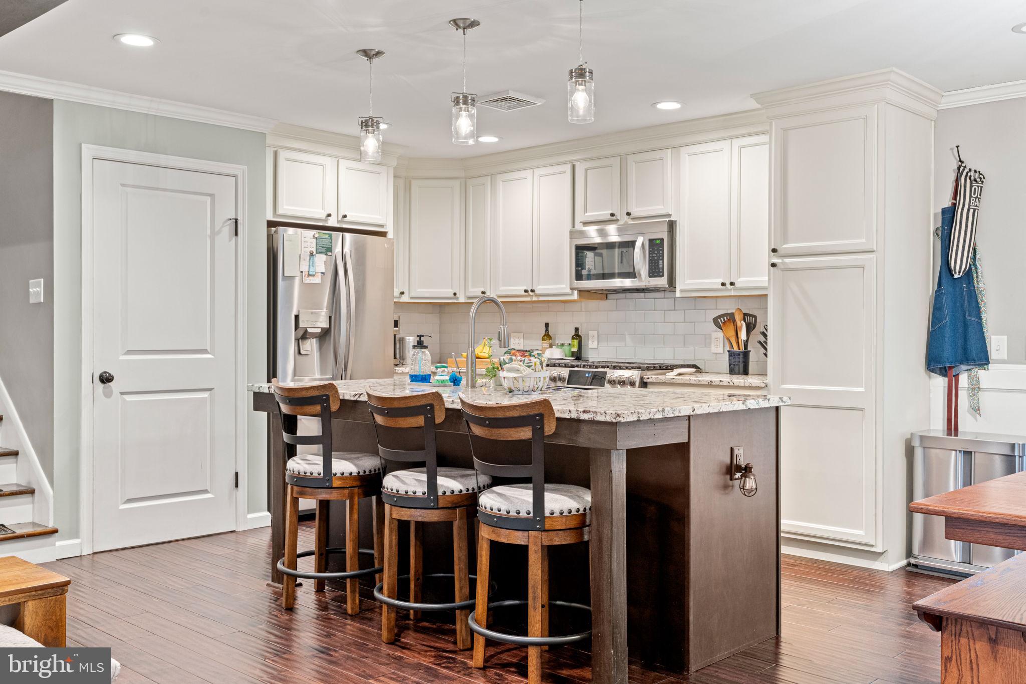 205 East Glenn Road Hershey, PA 17033 - Photo 10 of 52 a kitchen with stainless steel appliances granite countertop a refrigerator and a stove top oven